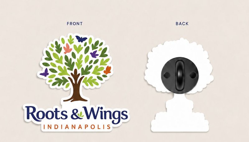 Enamel pin showing the Roots & Wings tree, front and back